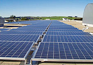 Rooftop of the U.S. Coast Guard (USCG) Training Center in Petaluma, California with a multiple arrays of photovoltaic solar modules